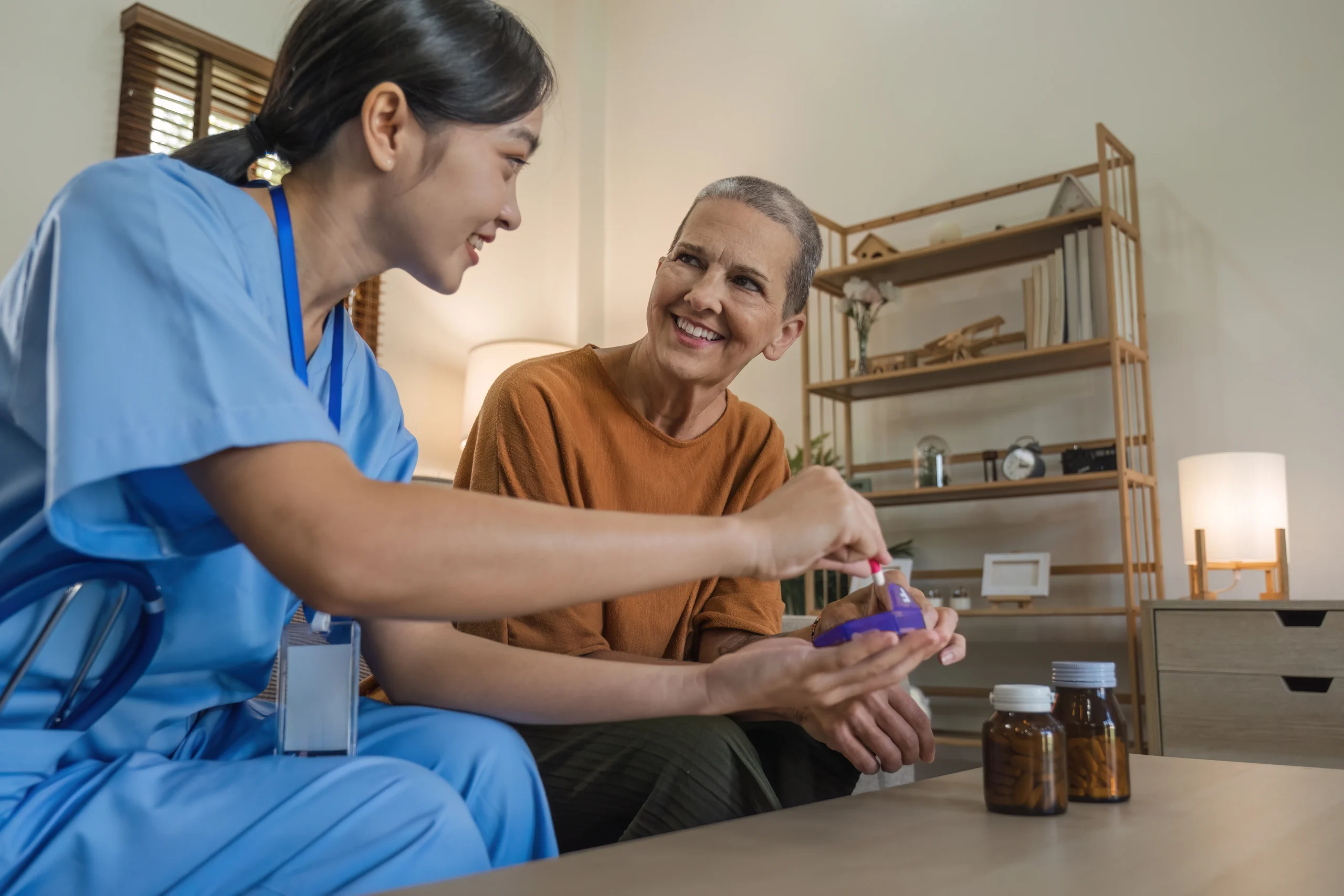 asian-caregiver-nurse-give-consult-to-caucasian-se-2025-01-16-13-14-31-utc